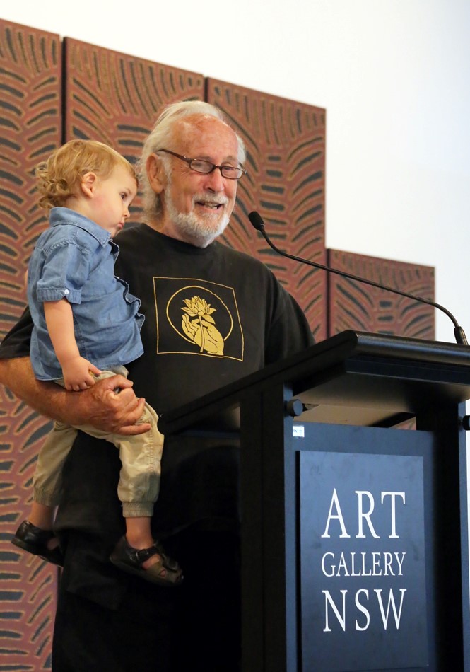 John Seed, helped by son River, giving speech at Judy's memorial